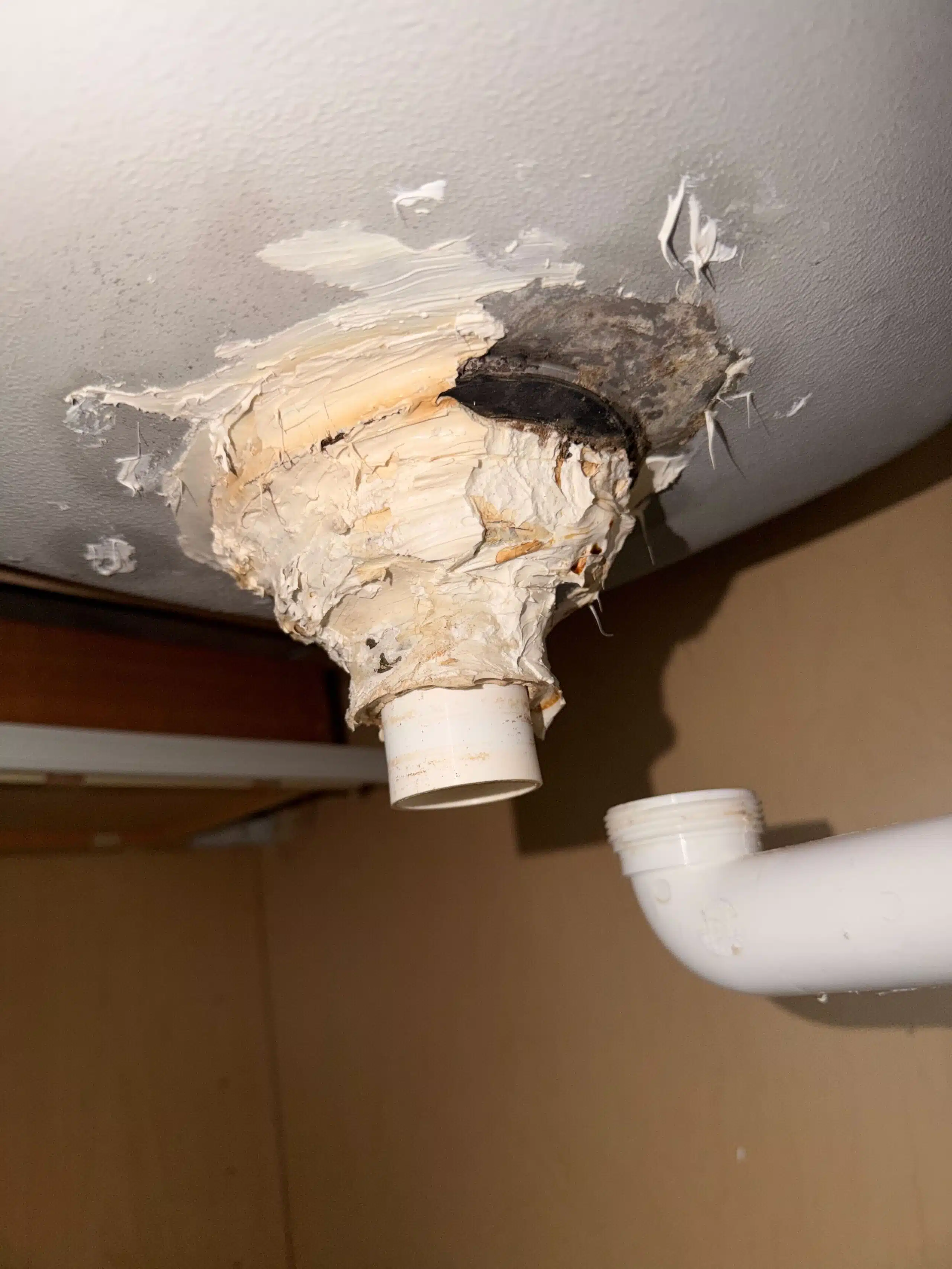 broken pipe under a sink at a home in Flagstaff Arizona
